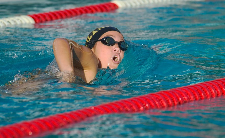 Female Freestyle Swimmer Black Cap