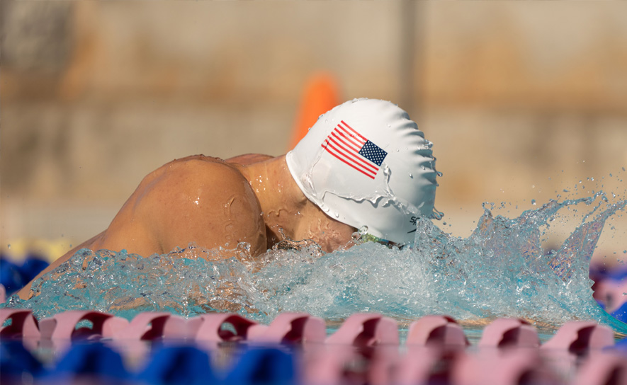 Male Breaststroke Swimmer with Speedo USA Cap