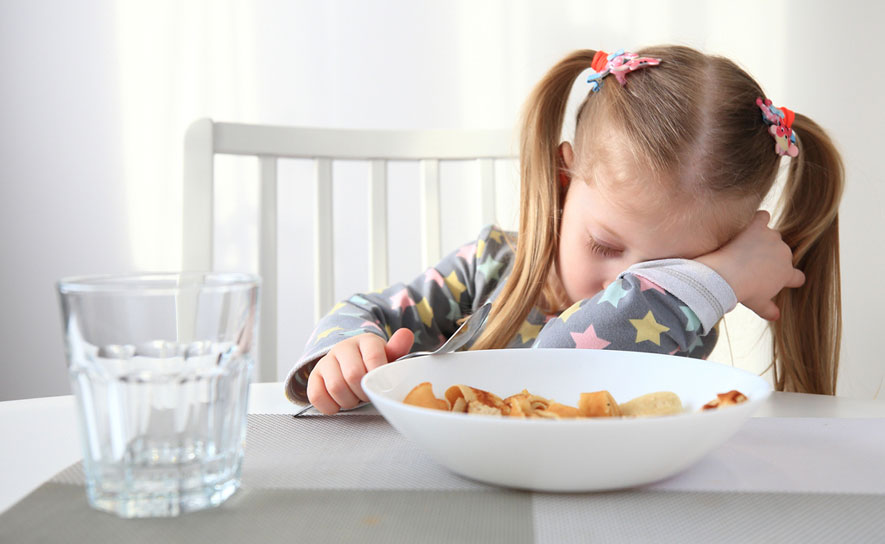 Girl Sleeping at Breakfast