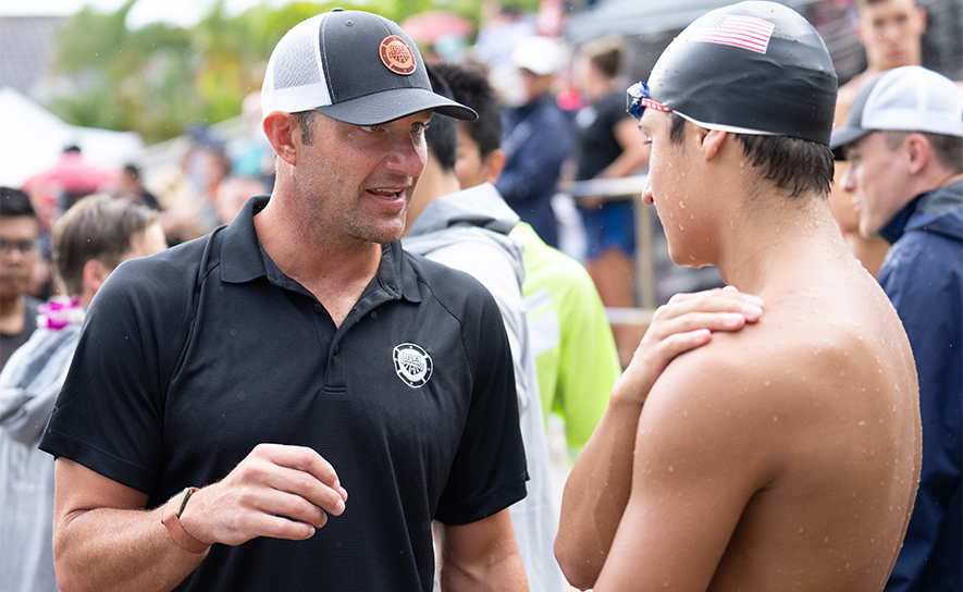 Brendan Hansen with Swimmer at Junior Pan Pacs