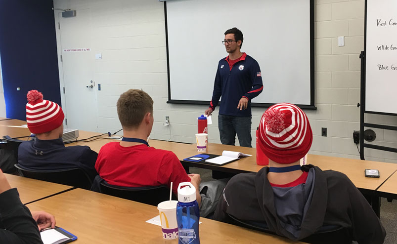 Justin Wright talks to swimmers at the 2018 National Select Camp.