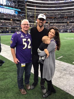 Bob Bowman and the Phelps family at a Baltimore Ravens game