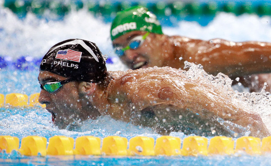 Phelps Gets Back to His Roots with Win in Olympic 200 Fly