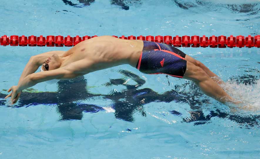 Double Gold, Triple Junior World Records for Michael Andrew 