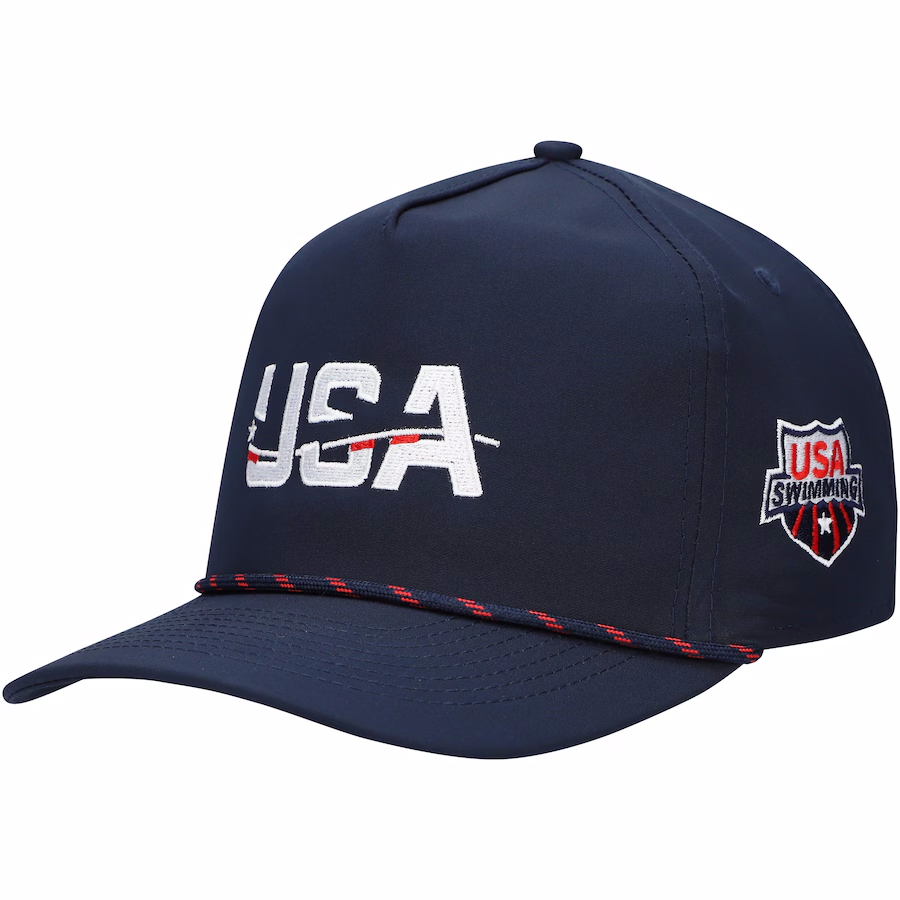 Show your USA Swimming spirit with this Imperial The Wrightson Rope Adjustable Hat. This USA Swimming hat features a five-panel retro fit and woven rope detail for a unique, sporty look. The embroidered Team USA wordmark on the front and shield logo on the side make it clear you're a dedicated fan. Made from a durable polyester-spandex blend, this hat is built to last and features a snap closure for a comfortable fit.|https://fanshop.usaswimming.org/mens-imperial-navy-usa-swimming-the-wrightson-rope-adjustable-hat/p-246601515927918914+z-99-3733136912?_ref=p-DLP:m-GRID:i-r0c0:po-0|0|stt3