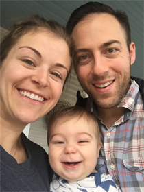 Garrett Weber-Gale with wife and son